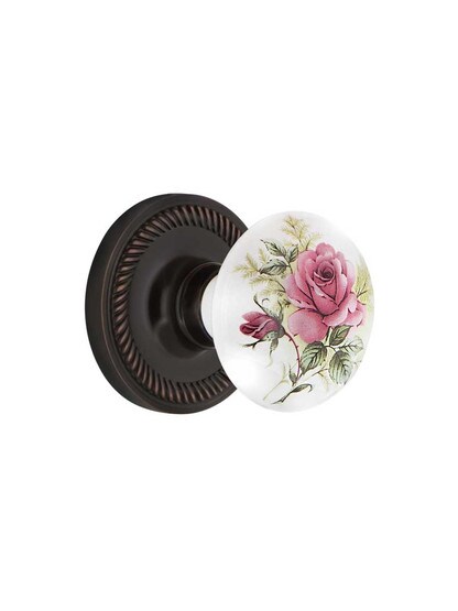 Rope Rosette Door Set with Rose Porcelain Knobs in Timeless Bronze.
